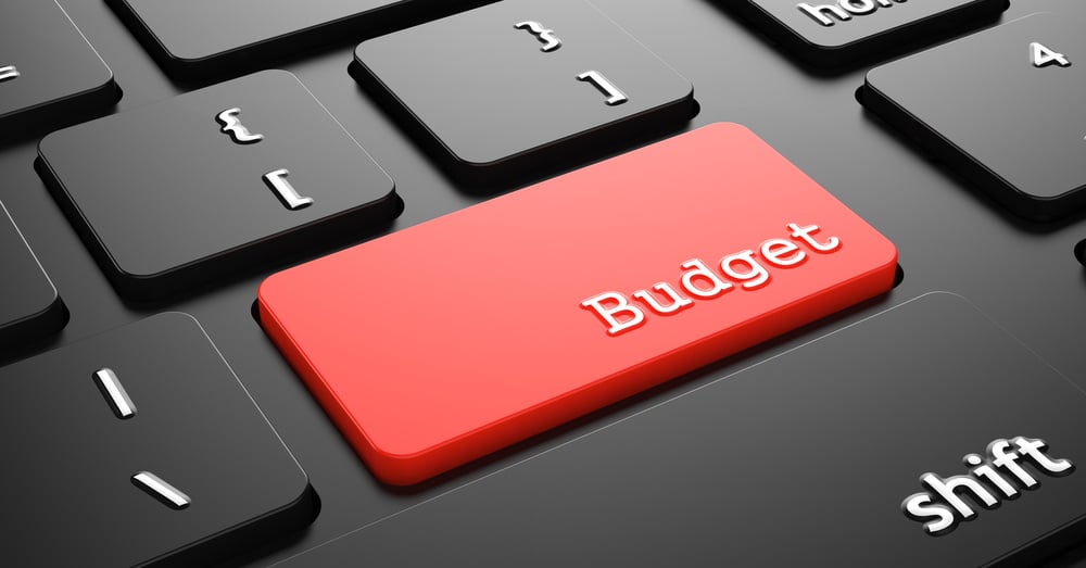 computer keyboard with the word budget in red, how to create a business budget