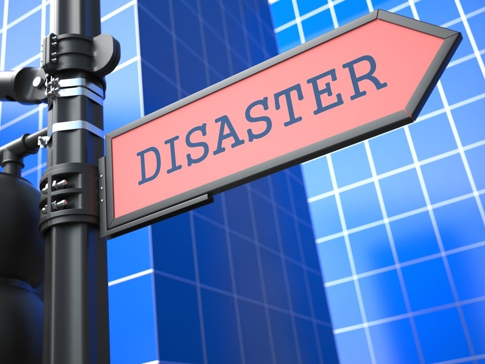 street sign that reads disaster, disaster planning for business