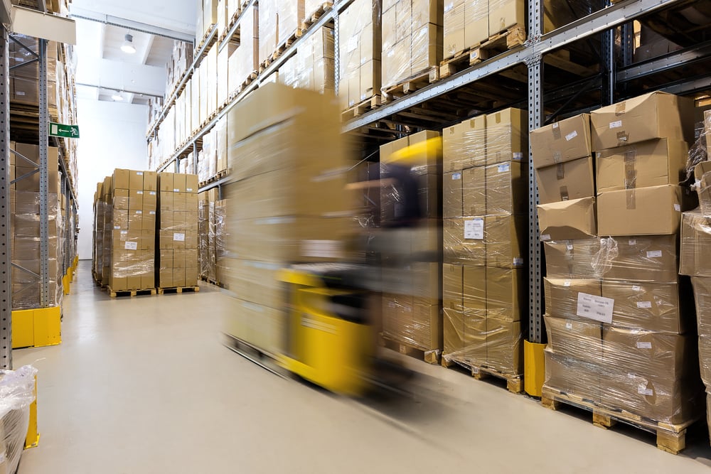 forklift operator preparing products for shipment