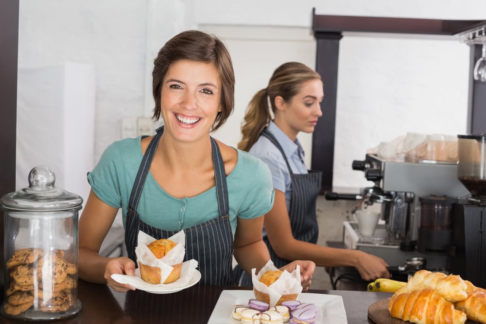 waitress working with a smile at the coffee shop