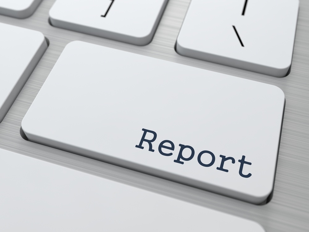 keyboard with report on a key, what is a business credit report