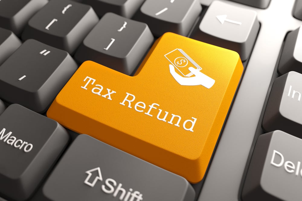 tax refund concept on computer keyboard, section 179 tax deduction overview