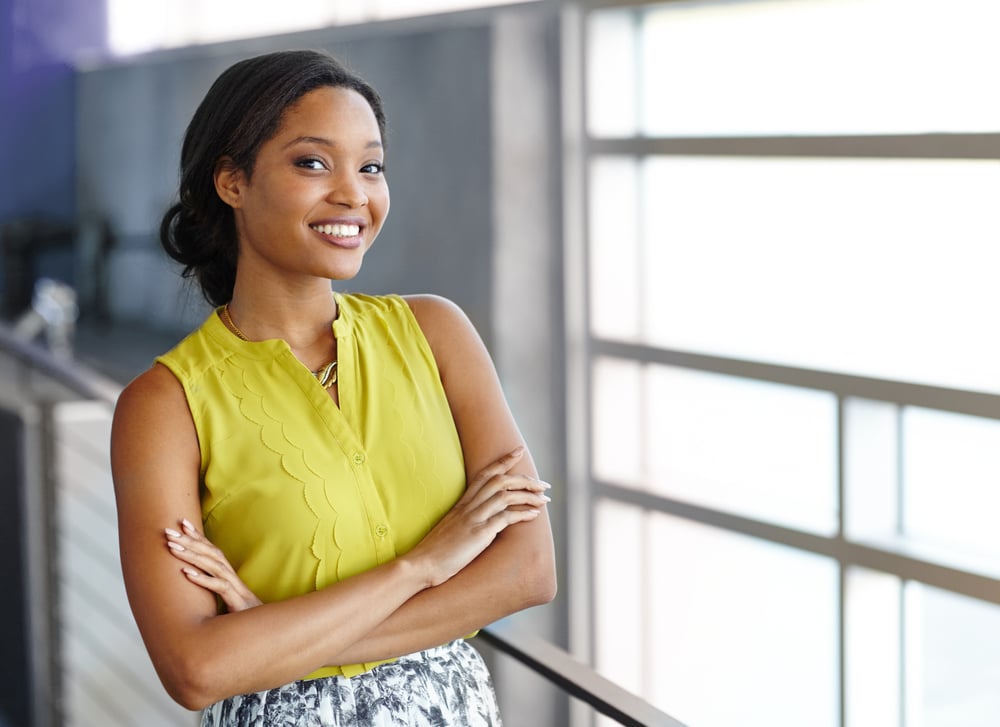 confident female business owner smiling, business term loans