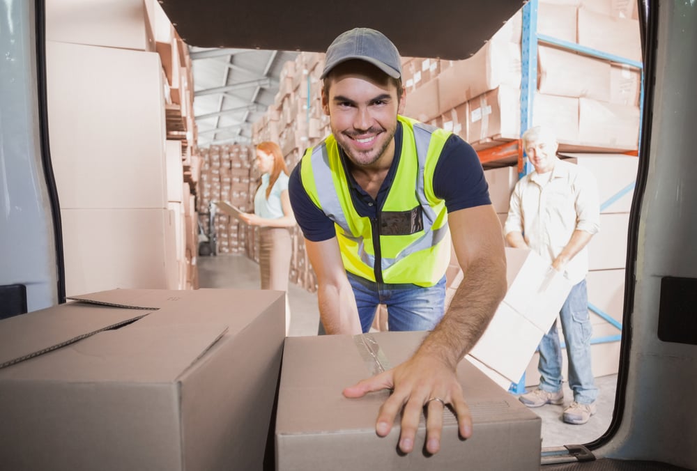 delivery van driver loading van with boxes, section 179 vehicles