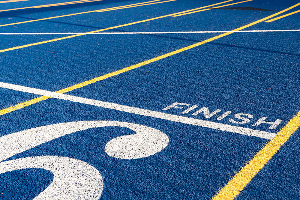 finish line, track and field, about huddle business capital