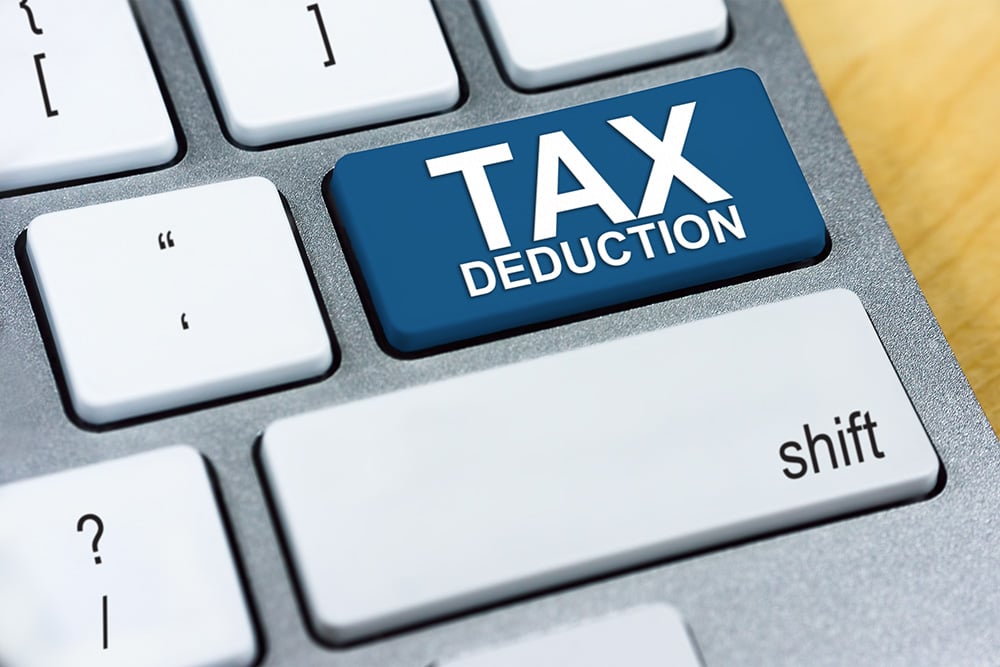 computer keyboard with tax deduction on a computer key, potential tax benefits for purchasing or financing portable sanitation equipment, section 179 for portable toilets